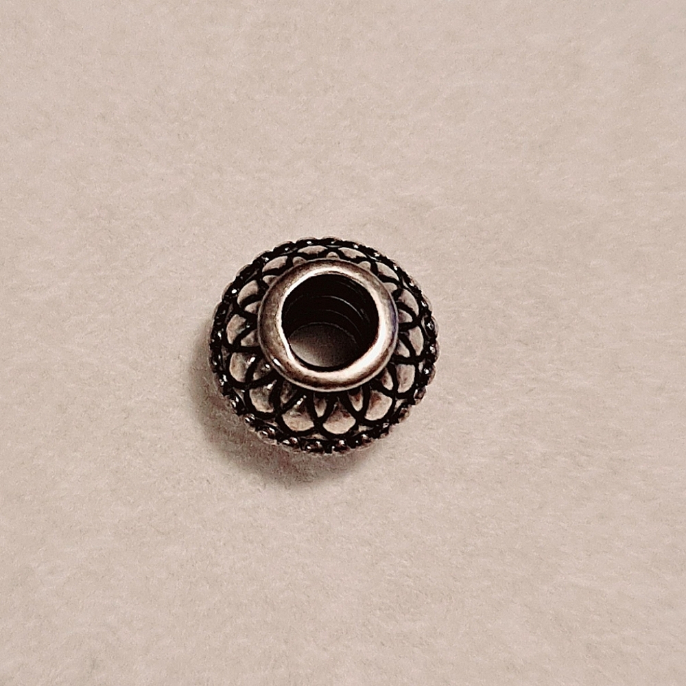 Pandora 925 ALE sterling silver "inner strength " bead/charm. Pre-owned. - Picture 4 of 4